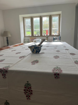 Block printed tablecloth pink flowers on cream background